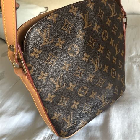 where to report fake louis vuitton